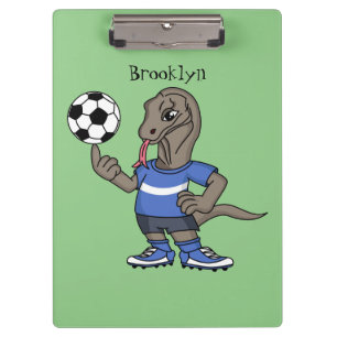 Cute funny Komodo dragon playing soccer cartoon Clipboard