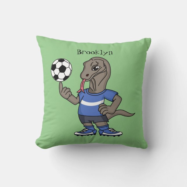 Cute funny Komodo dragon playing soccer cartoon Cushion (Front)