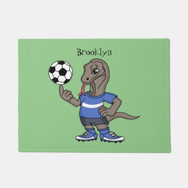 Cute funny Komodo dragon playing soccer cartoon Doormat (Front)