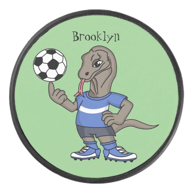 Cute funny Komodo dragon playing soccer cartoon Hockey Puck (Front)