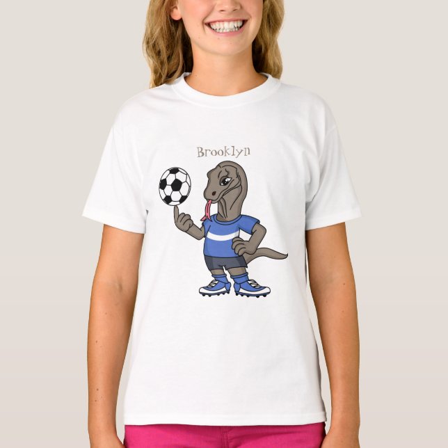 Cute funny Komodo dragon playing soccer cartoon T-Shirt (Front)