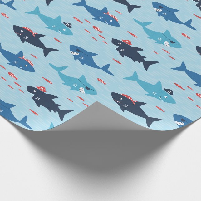 Cute funny sharks with pirate hats on blue wrapping paper (Corner)