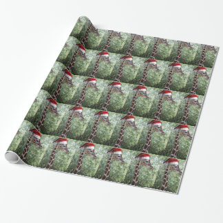 Cute Giraffe wearing a Santa Claus Hat Wrapping Paper