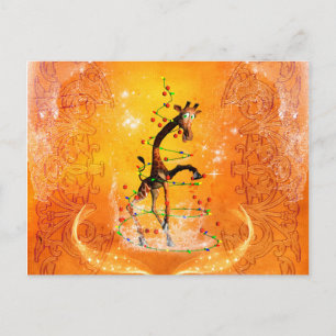 Cute  giraffe with christmas tree holiday postcard