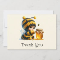 Cute Girl in Bee Costume with Honey