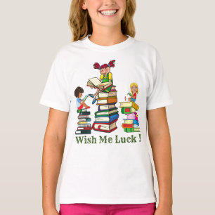 Cute girls sitting on a pile of books and reading  T-Shirt