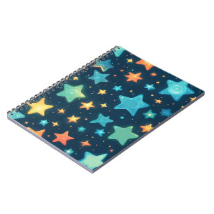 Cute glowing stars on blue notebook