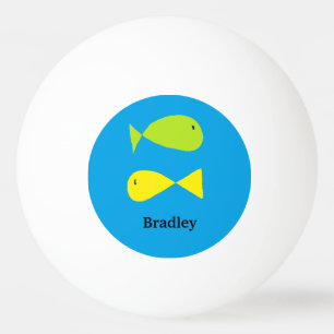 Cute green and yellow fishes on blue ping pong ball