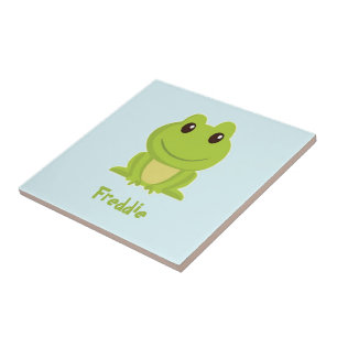 Cute green frog on blue tile
