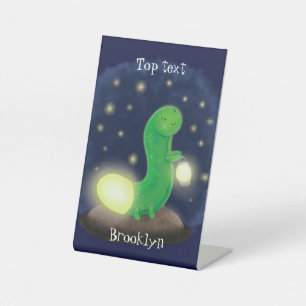 Cute green glow worm cartoon illustration pedestal sign