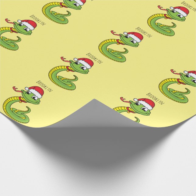 Cute green snake with santa hat cartoon wrapping paper (Corner)