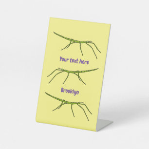 Cute green stick insects with happy faces cartoon  pedestal sign