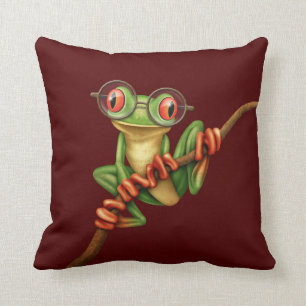 Cute Green Tree Frog with Eye Glasses on Red Cushion