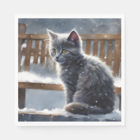 Cute Grey Cat on a Bench in the Snow