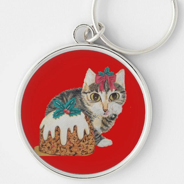 cute grey kitten licking paw at christmas key ring (Front)