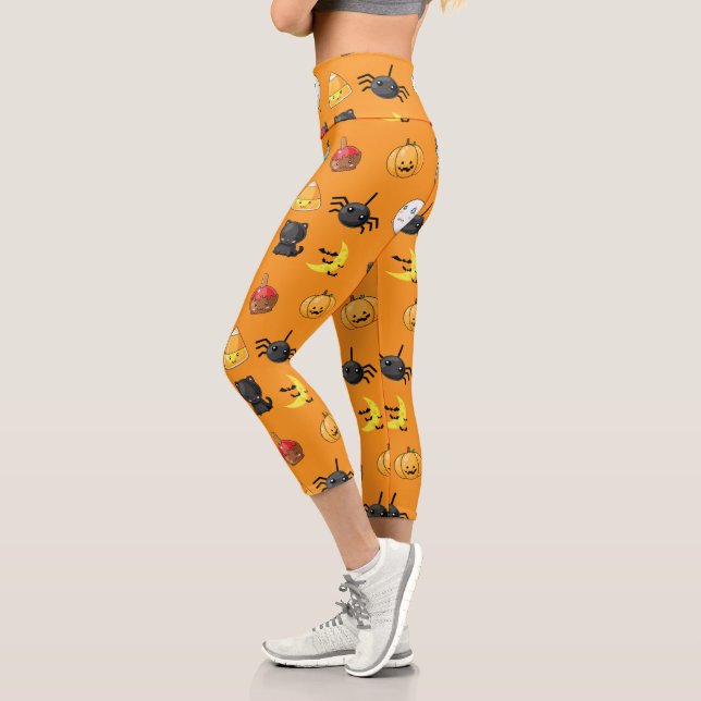 Cute Halloween Pattern with orange background Capri Leggings (Left)