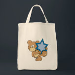 cute hanukkah teddy bear holding star of david tote bag<br><div class="desc">Such a cute little bear expressing emotion and action.  Provided by Dooni Designs.  Great gift for teddy bear collectors,  kids. or just anyone who loves bears and needs a smile.  Many products are customisable!</div>
