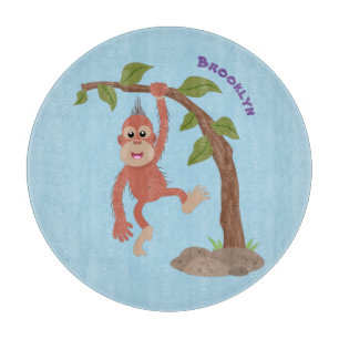 Cute happy baby orangutan cartoon illustration cutting board