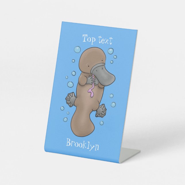Cute happy baby platypus cartoon illustration pedestal sign (Front)