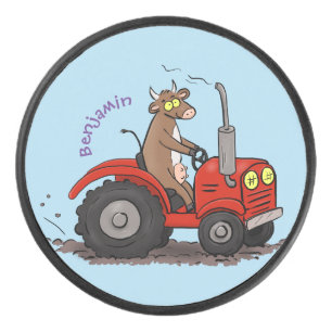 Cute happy cow driving a red tractor cartoon hockey puck