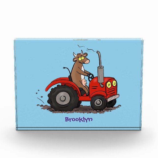 Cute happy cow driving a red tractor cartoon photo block (Front)