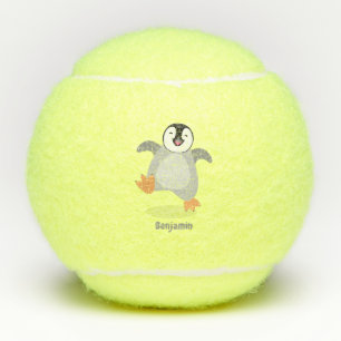 Cute happy emperor penguin chick cartoon tennis balls