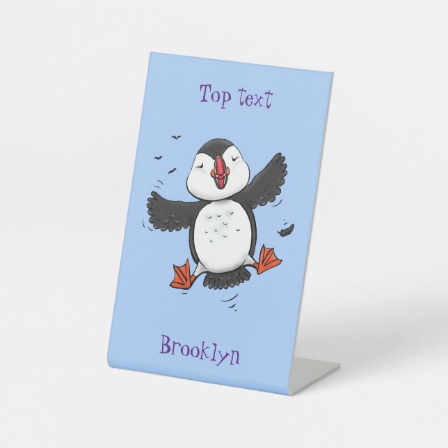 Cute happy flying puffin blue cartoon illustration pedestal sign (Front)
