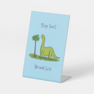 Cute happy green brontosaurus dinosaur cartoon pedestal sign