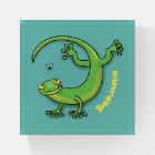 Cute happy green gecko greetings with bug cartoon