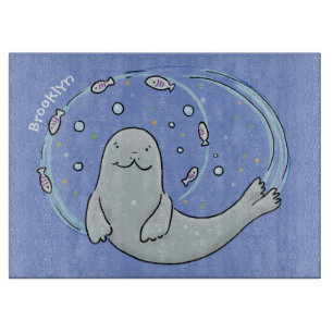 Cute happy seal and fish cartoon illustration cutting board
