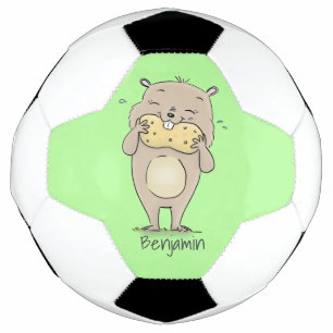 Cute happy smiling hamster with peanut cartoon football