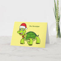 Cute happy tortoise wearing Santa hat