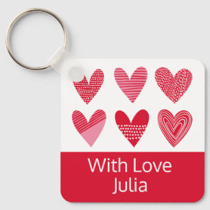 Cute hearts in red and pink with text key ring