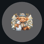 Cute Highland Cow With Snowman Hot Cocoa Christmas Classic Round Sticker<br><div class="desc">Cute Highland Cow With Snowman Hot Cocoa Christmas Trees Long Sleeve</div>