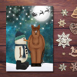 Cute Horse, Snowman, Santa and Reindeer Christmas Holiday Card<br><div class="desc">Cute Brown Horse and Snowman with Santa and his Reindeer flying across a full moon on a Snowy Christmas Eve Holiday Christmas Card. Inside Greeting - "Wishing You A Merry Christmas And A Happy New Year! May All Your Holiday Dreams And Wishes Come True.". Greeting can be personalized to read...</div>