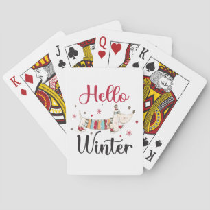 Cute ice skating dog playing cards