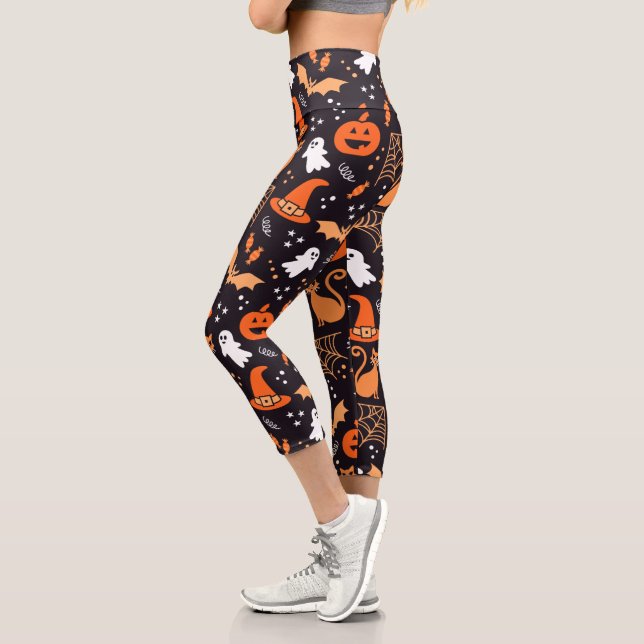 Cute Illustrated halloween characters on black bg Capri Leggings (Left)