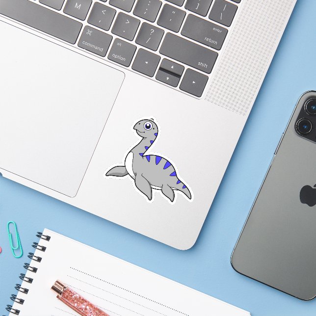 Cute Illustration Of A Loch Ness Monster. (Laptop w/ iPhone)