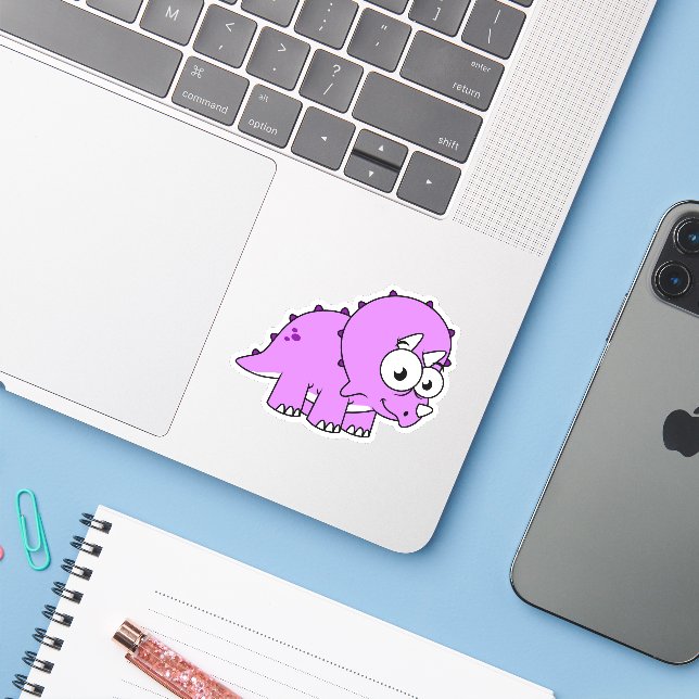 Cute Illustration Of A Triceratops. (Laptop w/ iPhone)