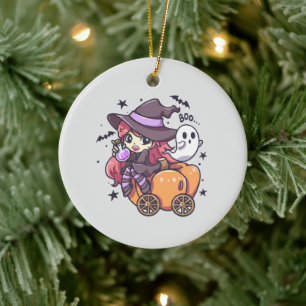 Cute Kid Witch Sitting on a Pumpkin Car Ceramic Tree Decoration