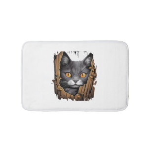 Cute kitten looks from torn fabric - Cats T-Shirt Bath Mat