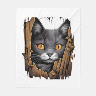 Cute kitten looks from torn fabric - Cats T-Shirt Fleece Blanket