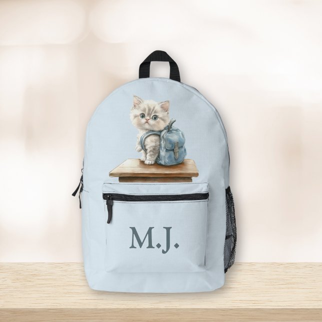Cute Kitten with Backpack Custom Monogram Backpack (Cute Kitten with Backpack Custom Monogram Backpack on a wooden table)