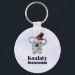 Cute Koala Pun Koalaty Groomsman Key Ring<br><div class="desc">A keychain with a cute koala bear in a black top hat with a red ribbon. Fancy and furry. Text says Koalaty Groomsman. Funny pun. Set on a light purple background.</div>
