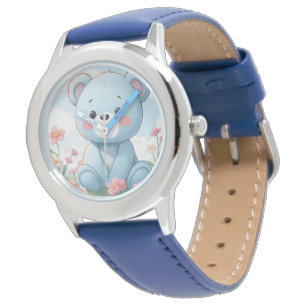 Cute little blue teddy bear in garden watch