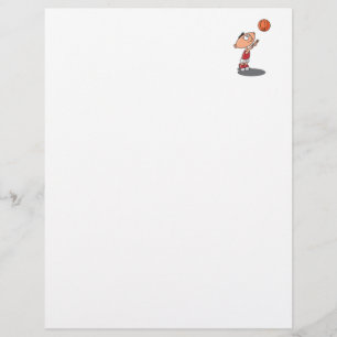cute little boy shooting a basketball
