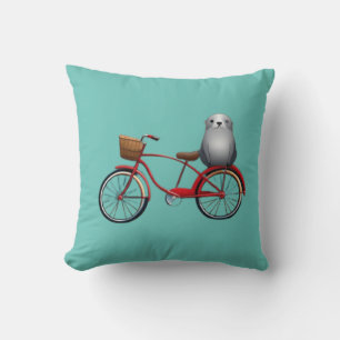 Cute little cartoon seal on a bicycle cushion