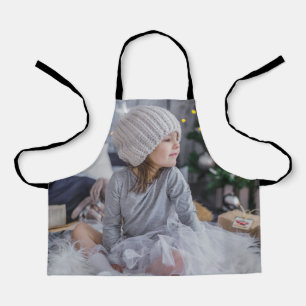 Cute little child girl and  the Christmas tree .jp Apron