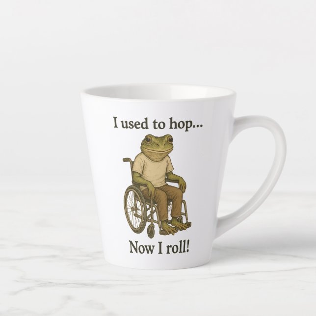 Cute little frog in a wheelchair being positive. latte mug (Right)