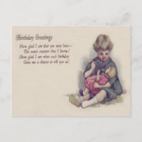 Cute Little Girl Feeding Her Doll